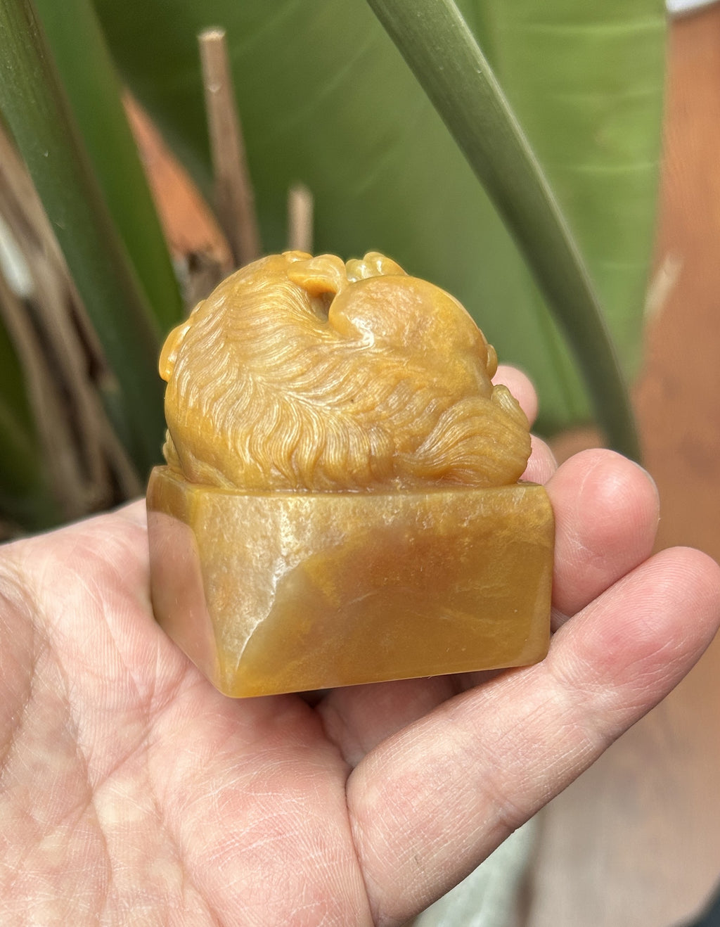Front angle of auspicious Pixiu playing with pearl carving on malt Tianhuang square seal