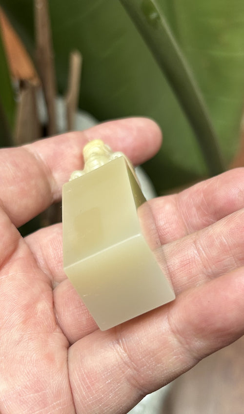 Top view showing smooth square flat stamping base of Laos stone chop